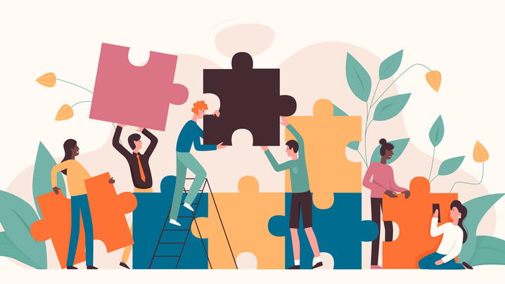 Illustration of diverse individuals piecing together a large puzzle