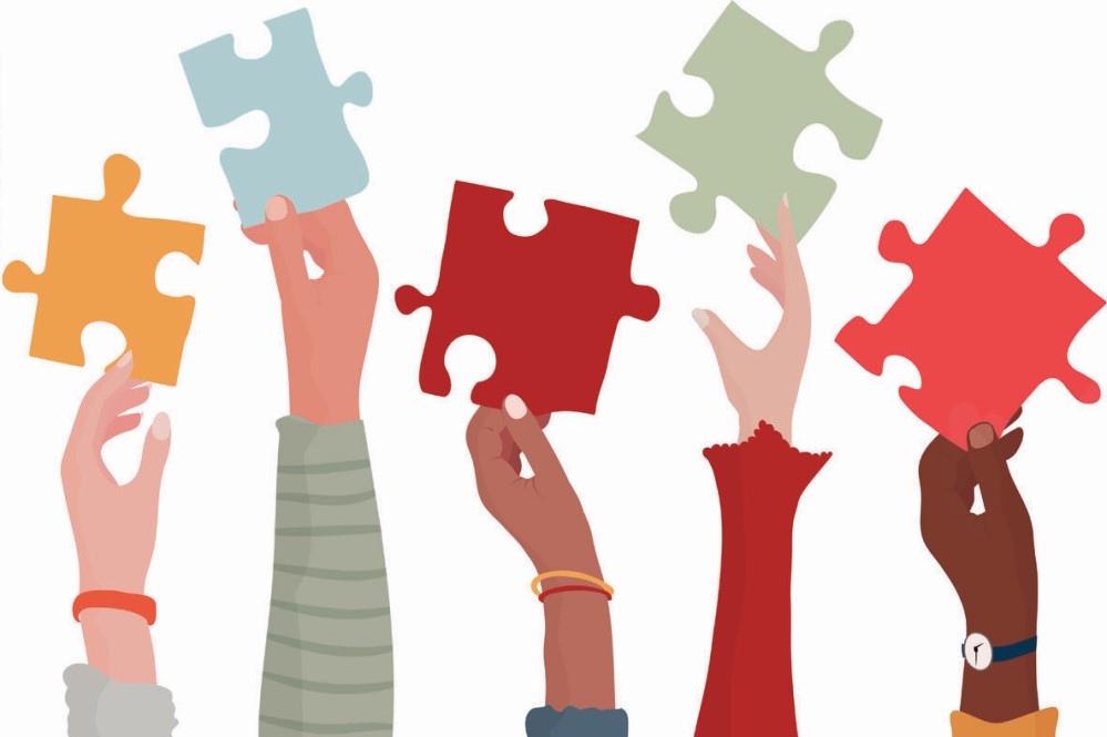 Illustration of people holding puzzle pieces