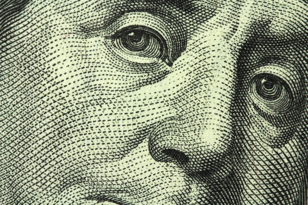 Close-up image of Benjamin Franklin from $100 bill