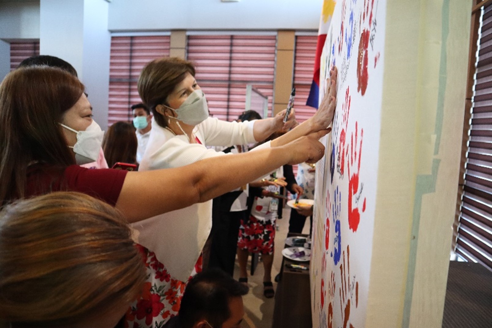 Participants seal their commitment to promote and practice Safe Space in Tagbilaran City.