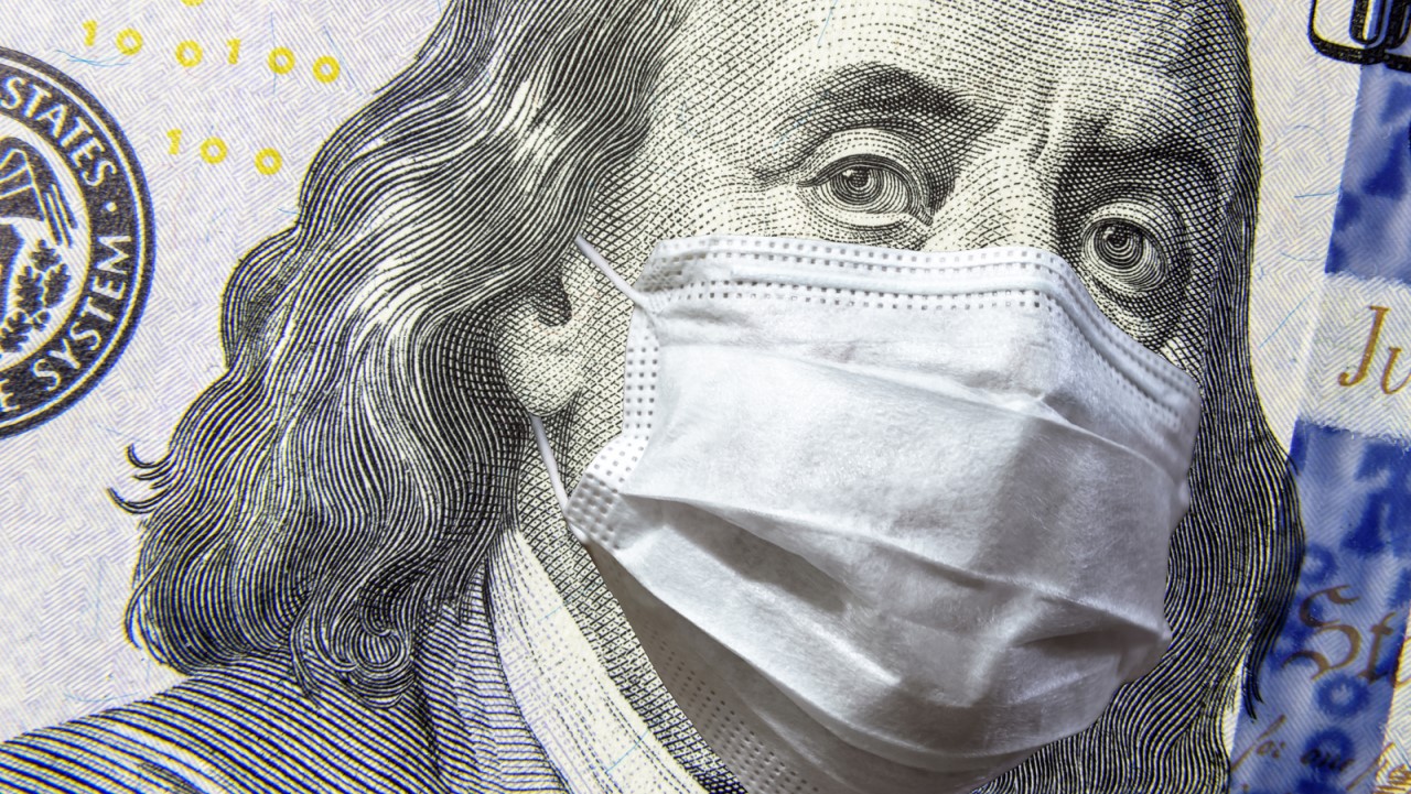 Image of Ben Franklin on $100 bill in a mask