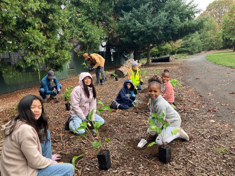 Planting with family at the Downs