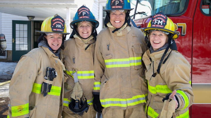 Firefighter Sandy Dostal, Excelsior Councilmember Lou Dierking, Tonka Bay City Administrator Kathy Laur, and Fire Marshal Kellie Murphy-Ringate