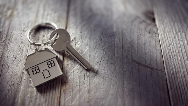 Image of a keychain with a house key