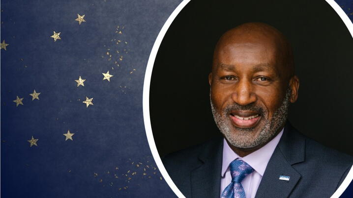 Image of Marc Ott and gold stars on blue background