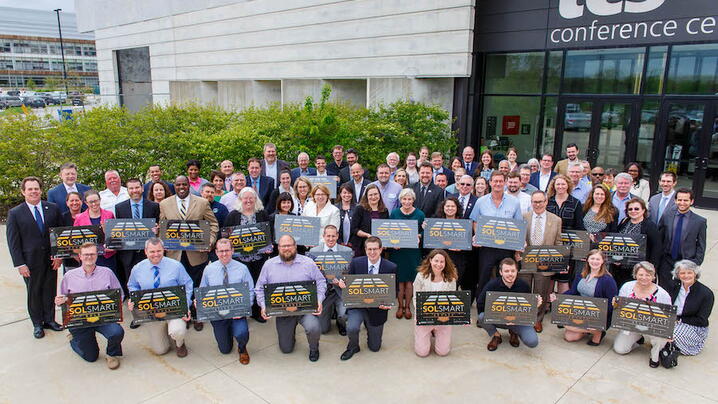 Local government officials with SolSmart plaques