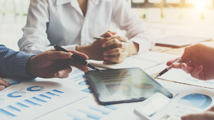 Business team with document data graph and budgeting