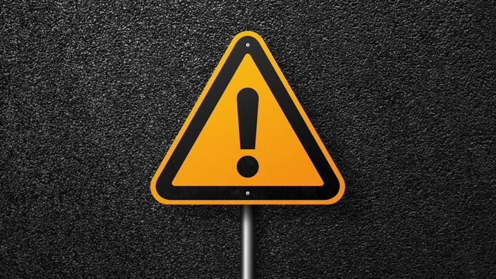 Image of caution road sign