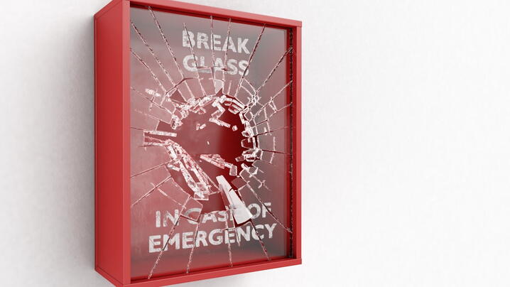 Image of emergency box being broken