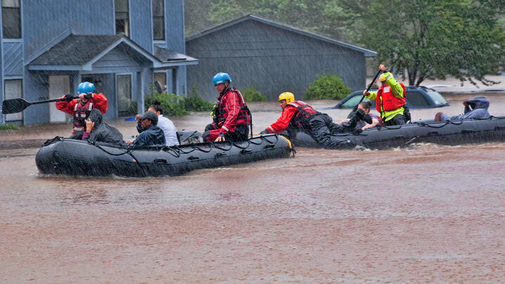 Photo of rescue workers in rafts