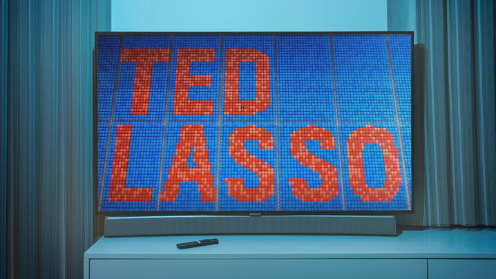 Image of Ted Lasso words on a tv