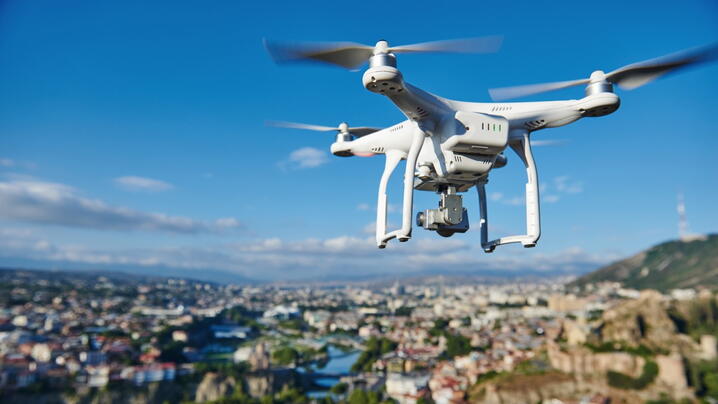 Photo of a drone over a community