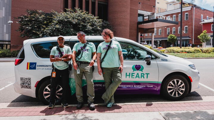HEART workers in front of vehicle