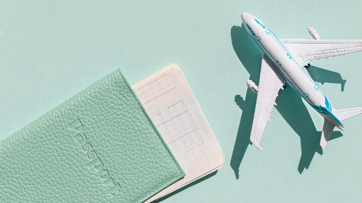 Image of passport and plane