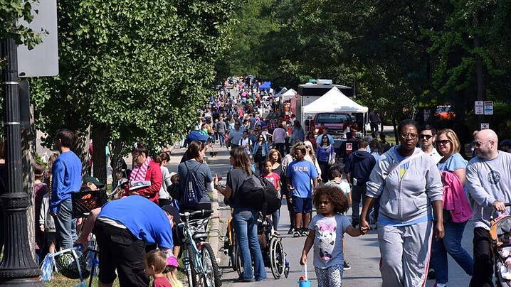 people walking during street fair