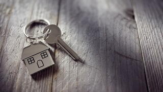 Image of a keychain with a house key