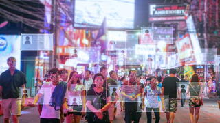 Photo of crowded city street with facial recognition software in use