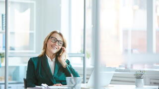 Photo of a woman on the phone