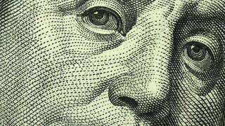 Close-up image of Benjamin Franklin from $100 bill