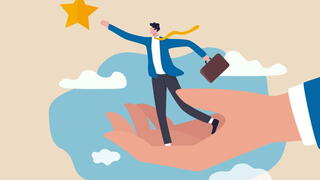 Illustration of businessperson reaching out toward a star