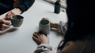 Image of people having coffee