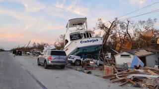 Photo showing devastating destruction and debris on San Carlos Blvd. in Fort Myers Beach, Florida, after Hurricane Ian.