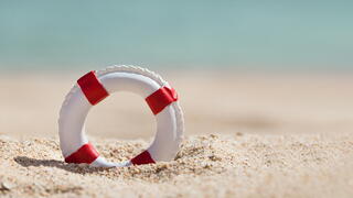 Life preserver on beach