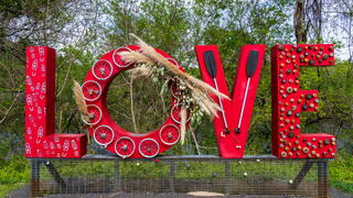 One of Virginia’s 300+ LOVEworks signs, located in Lynchburg, Virginia, USA.