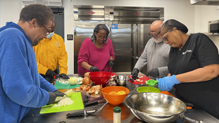 Photo of folks preparing food