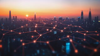 Image of sunset over city skyline