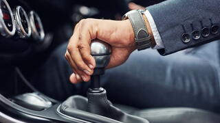 Image of hand on gearshift