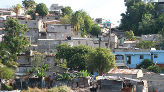 Dominican Republic city scene, buildings near river